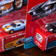 Special Editions, both 1 of 1248. However, the regular release (white car) is 1 of 1256! So not much difference. :-)